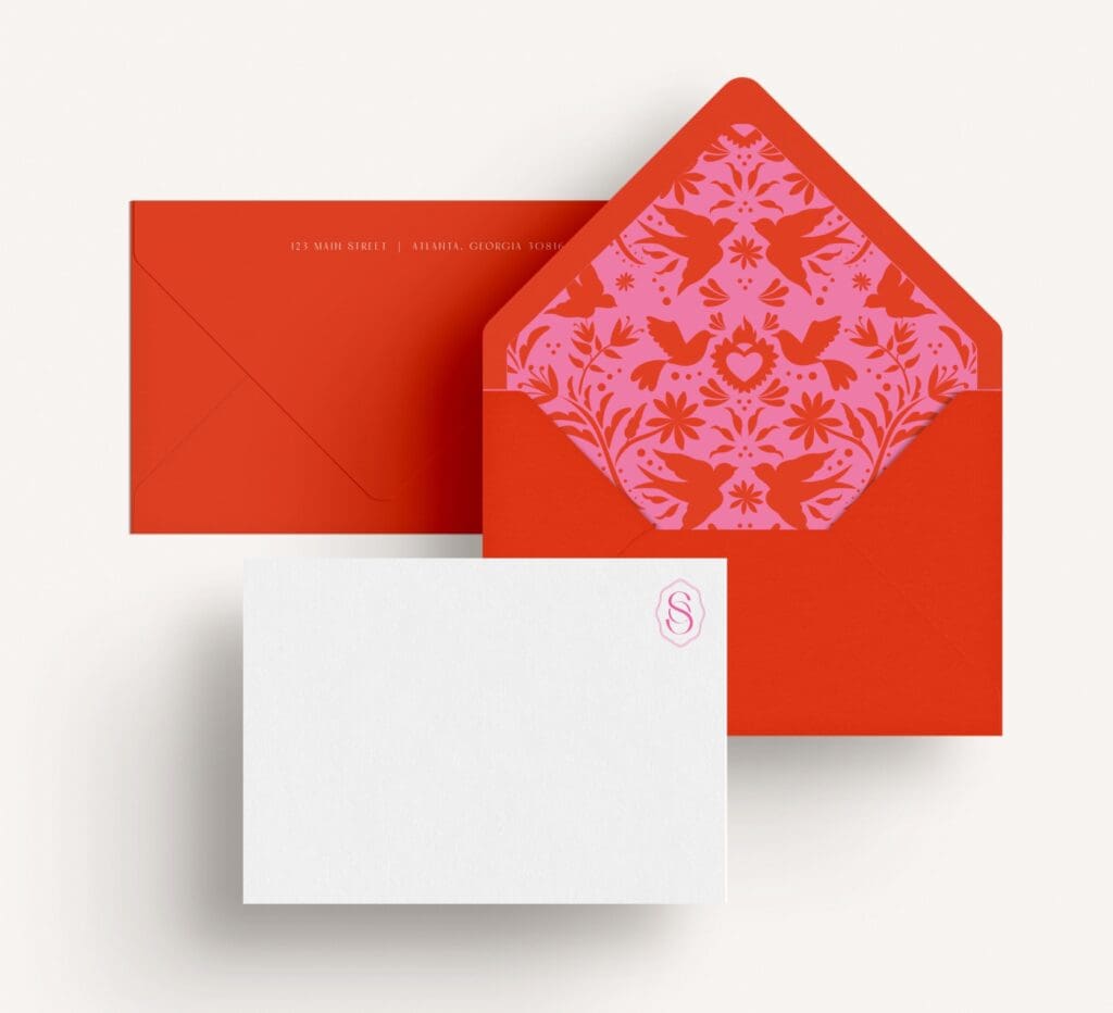 An envelope suite made with a small business's brand colors