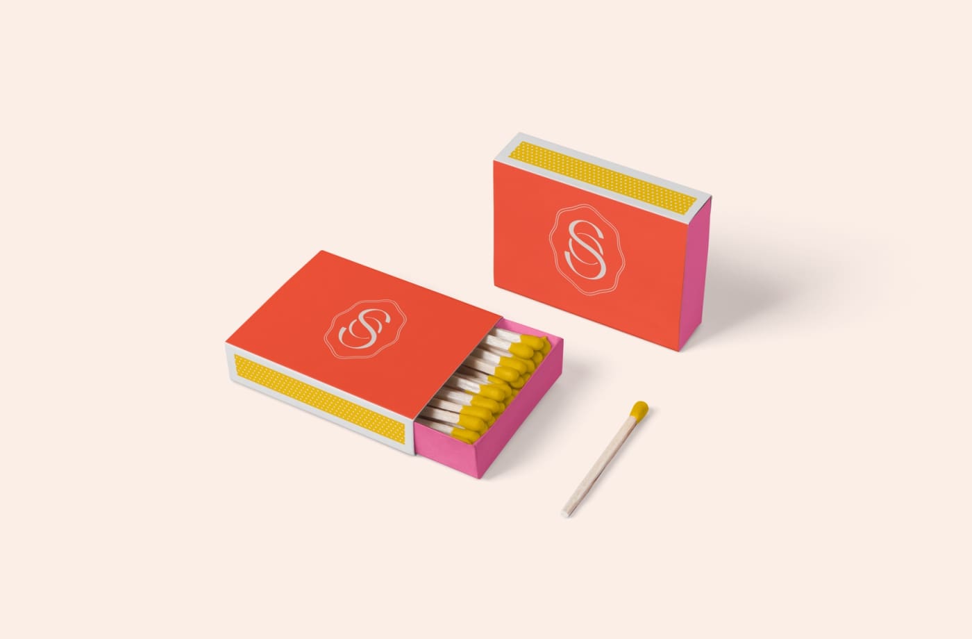 Matchboxes made with a wedding planner's brand colors