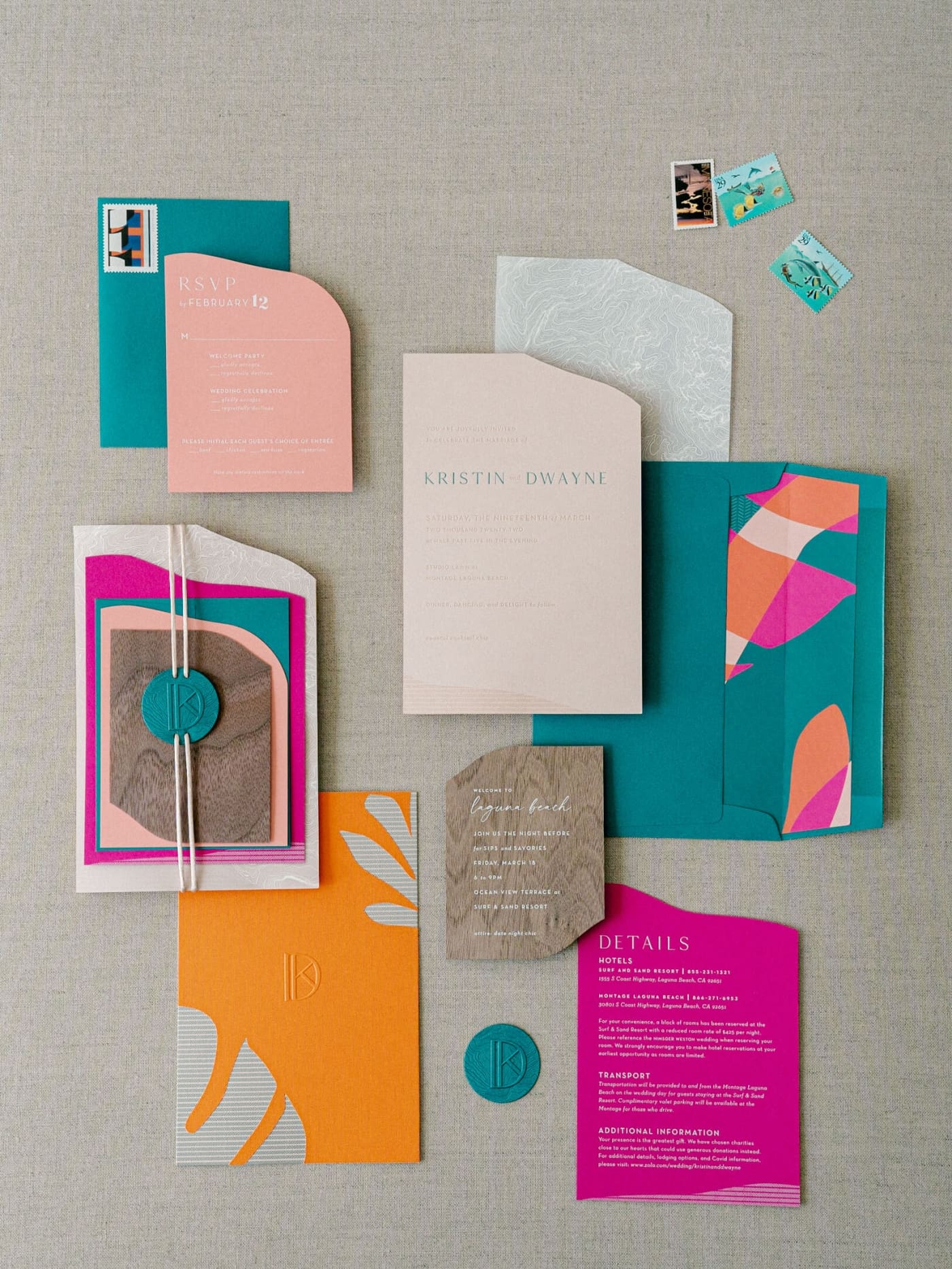 A flat-lay of custom wedding stationery in vibrant, coastal tones